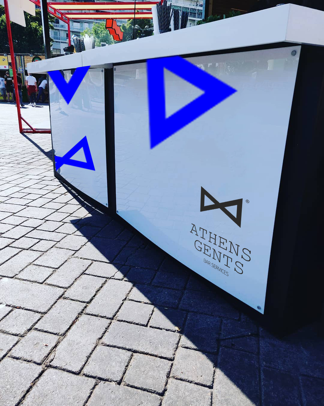 Athens Gents bar with blue geometric graphics outdoors — Poua Design